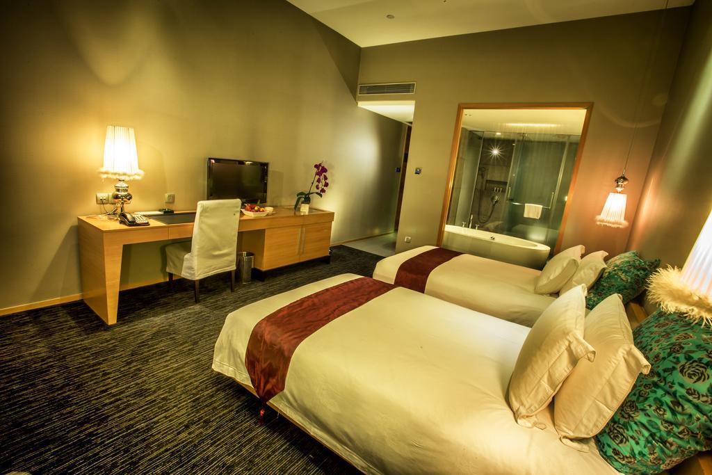 Guangzhou Carat Hotel Стая снимка